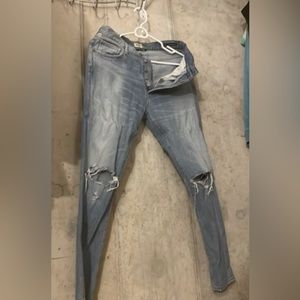 Citizens of Humanity light blue distressed jeans with rip details.